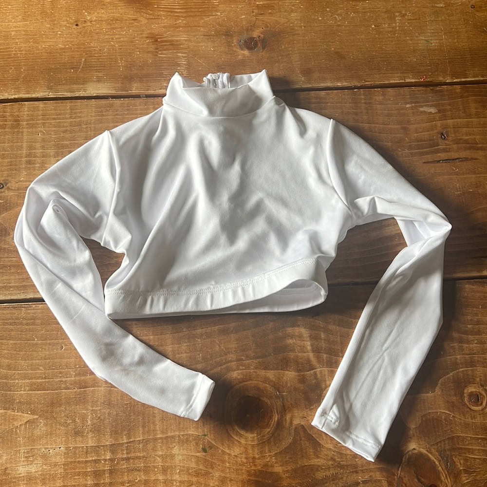 Varsity Spirit cheer crop top.